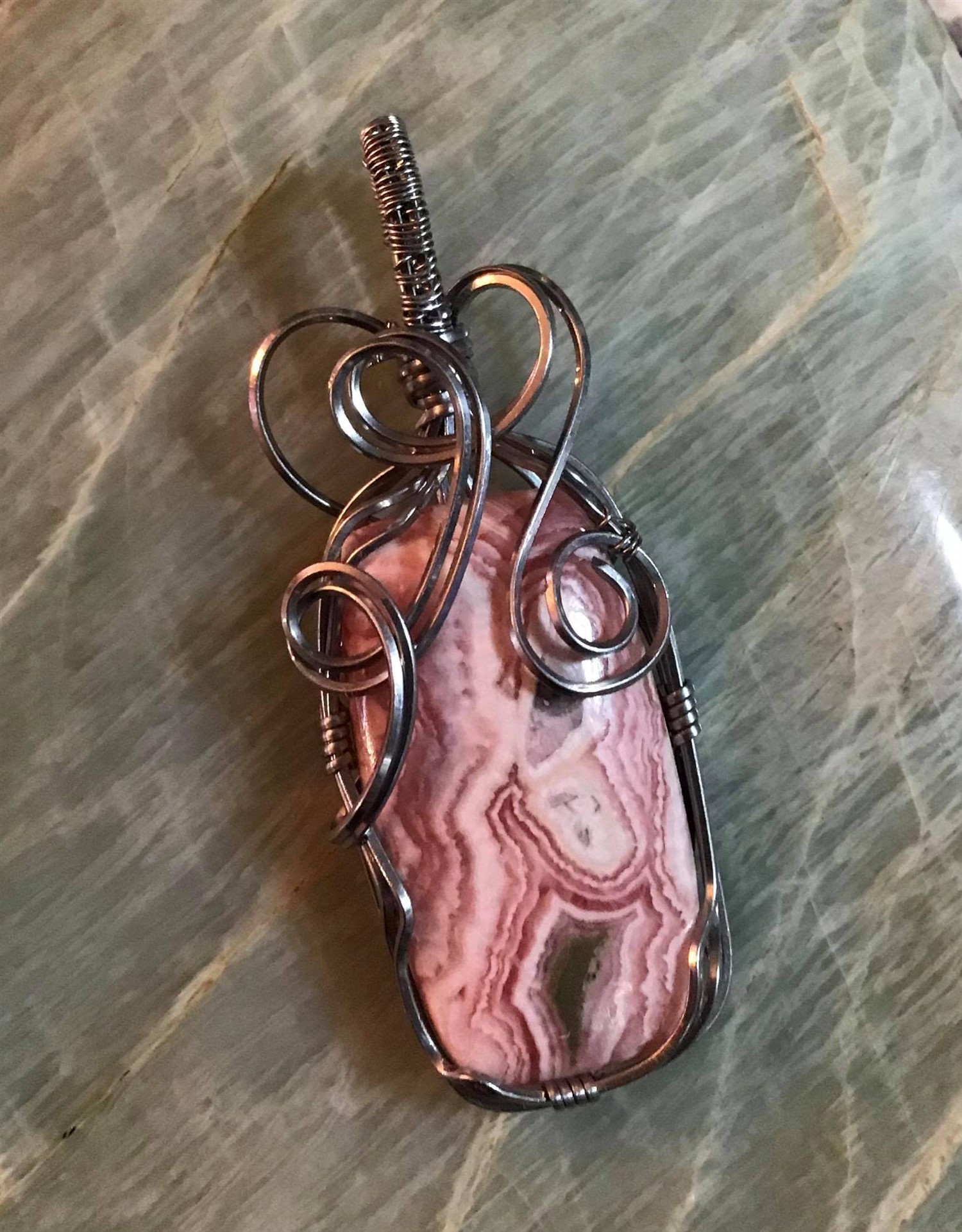 Rhodochrosite and Stainless Steel